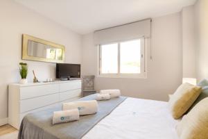 Posteľ alebo postele v izbe v ubytovaní MARBELLA BANUS SUITES - Marbella Centre Soriano 56 Suite Apartment