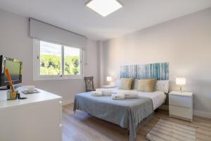 Posteľ alebo postele v izbe v ubytovaní MARBELLA BANUS SUITES - Marbella Centre Soriano 56 Suite Apartment