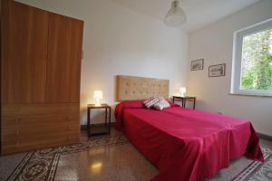 A bed or beds in a room at Villa Flores a Mondello by Wonderful Italy