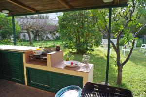 A garden outside Villa Flores a Mondello by Wonderful Italy