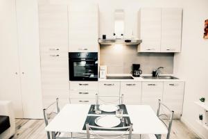 Kuhinja oz. manjša kuhinja v nastanitvi Stazione-Centro Luminoso Bilocale