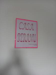 a sign that reads casa bernum on a wall at Casa Beranu in Maracalagonis
