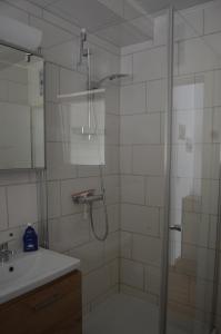 Koupelna v ubytování Kutter im Schiffehaus + 35 fotografií