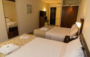 Postel nebo postele na pokoji v ubytování Elo Hotels Express