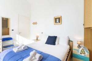 A bed or beds in a room at Villino Fonte del Mare Még 28 kép