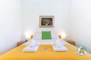 A bed or beds in a room at Villino Fonte del Mare