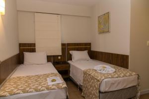 Postel nebo postele na pokoji v ubytování Elo Hotels Express