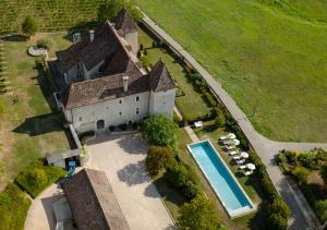 an aerial view of a large house with a swimming pool at Château de La Mar Chambres d'Hôtes in Jongieux
