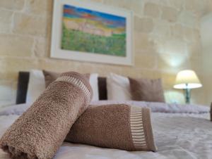 Letto o letti in una camera di Gawhra B&B