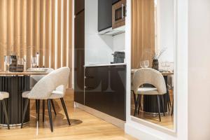 A kitchen or kitchenette at Elegant studio in the heart of Malaga by REMS