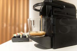 Coffee and tea making facilities at Elegant studio in the heart of Malaga by REMS