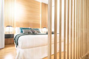 A bed or beds in a room at Elegant studio in the heart of Malaga by REMS