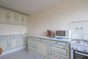 A kitchen or kitchenette at Côté cottage beautiful view to the harbor !