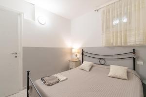 Postel nebo postele na pokoji v ubytování La CORTE di GIO' 1