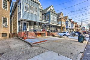 a row of houses on a city street at Jersey City Apartment Near Liberty State Park in Jersey City