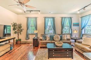 a living room with a couch and a table at Dwtn Condo 4 Blocks to The Wilmington Riverwalk! in Wilmington