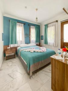 Postel nebo postele na pokoji v ubytování Loya Vita Hotel + 32 fotografií