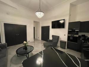 Area tempat duduk di Royal Mile Apartment 2Bedroom