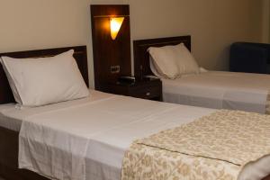 Postel nebo postele na pokoji v ubytování Elo Hotels Express