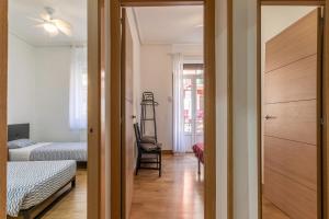 Postel nebo postele na pokoji v ubytování Apartamento junto al Guggenheim con parking gratuito