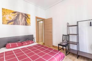 Postel nebo postele na pokoji v ubytování Apartamento junto al Guggenheim con parking gratuito
