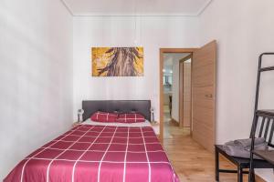 Postel nebo postele na pokoji v ubytování Apartamento junto al Guggenheim con parking gratuito