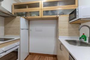 Kuchyň nebo kuchyňský kout v ubytování Apartamento junto al Guggenheim con parking gratuito