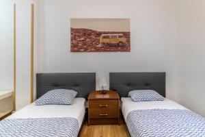 Postel nebo postele na pokoji v ubytování Apartamento junto al Guggenheim con parking gratuito
