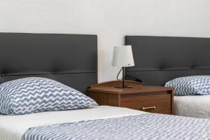 Postel nebo postele na pokoji v ubytování Apartamento junto al Guggenheim con parking gratuito