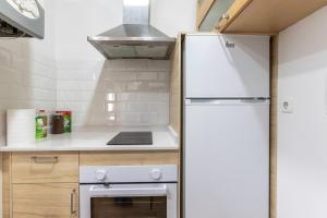 Kuchyň nebo kuchyňský kout v ubytování Apartamento junto al Guggenheim con parking gratuito