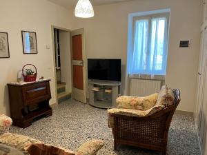 Appartamento a Pianello, dintorni di Assisi tesisinde bir televizyon ve/veya eğlence merkezi