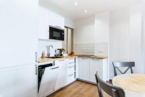 A kitchen or kitchenette at Apartamento Playa del Cura