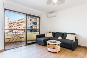 A seating area at Apartamento Playa del Cura