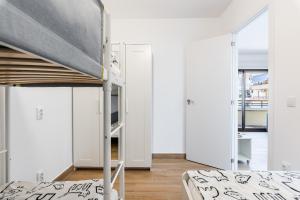 A bed or beds in a room at Apartamento Playa del Cura