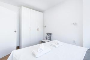 A bed or beds in a room at Apartamento Playa del Cura
