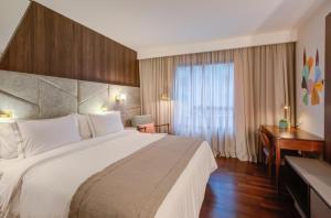 Cama ou camas em um quarto em Qoya São Paulo Paulista, Curio Collection by Hilton