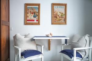 A seating area at Capri magic house on the beach