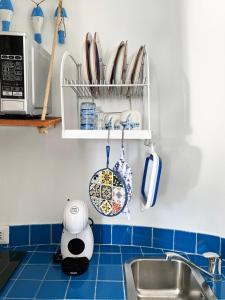 A kitchen or kitchenette at Capri magic house on the beach
