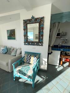 A seating area at Capri magic house on the beach