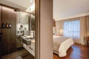 Cama ou camas em um quarto em Qoya São Paulo Paulista, Curio Collection by Hilton
