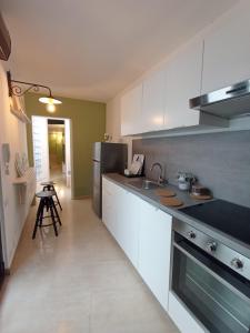 A kitchen or kitchenette at Villetta Marianna