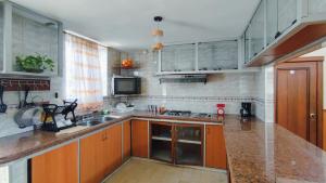 Kuchyň nebo kuchyňský kout v ubytování Hotel Livingston Inn