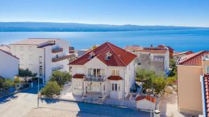 an aerial view of a house and the water at OMIŠ Dream house in Omiš