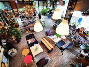 an overhead view of a store with chairs and lamps at 26bed and coffee in Ban Rong Khoei