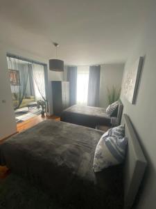 Postel nebo postele na pokoji v ubytování B&B bei Pepe Nero