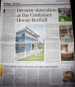 a newspaper clipping of a house in a newspaper at Redhill Container House & Private Spa in Nairobi
