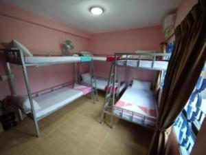 Postel nebo postele na pokoji v ubytování Bun Kao Guesthouse
