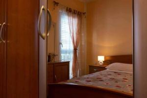 Postel nebo postele na pokoji v ubytování Apartment Nikolina