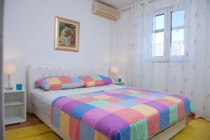 Postel nebo postele na pokoji v ubytování Villa Doris