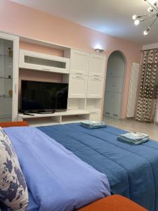 Tempat tidur dalam kamar di Civita Home